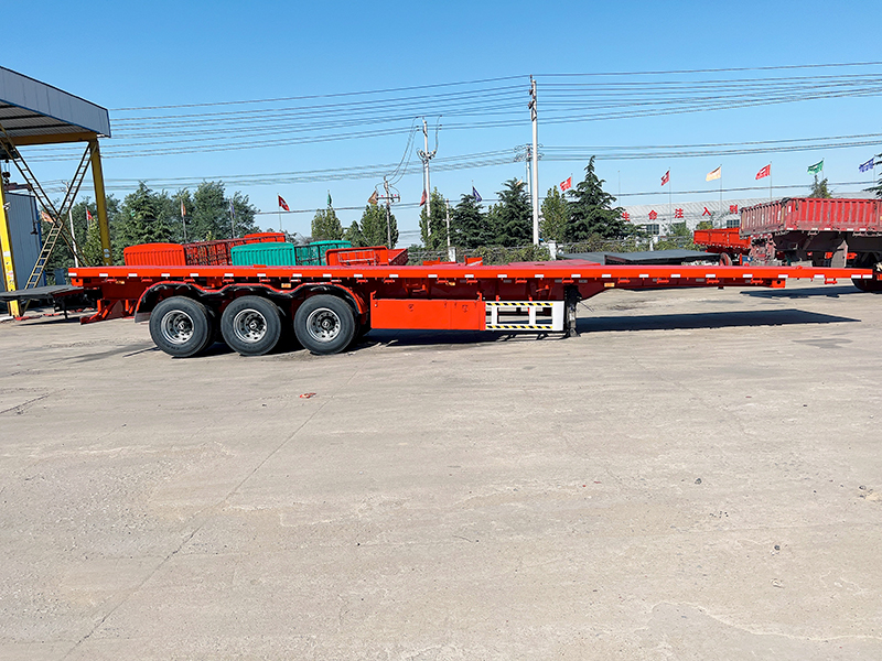 La semi-remorque à plateau à plaques pour le transport de matériaux en acier à haute résistance 30-60 tonnes 3 essieux