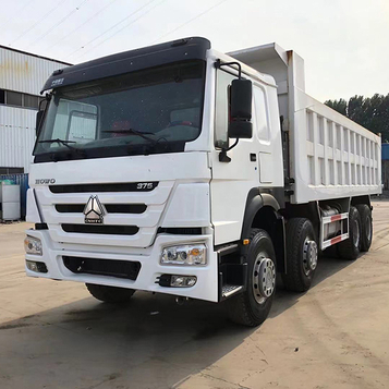 Camion à benne basculante Howo 8×4 blanc 30 tonnes 12 roues d'occasion sinotruck 375hp 
